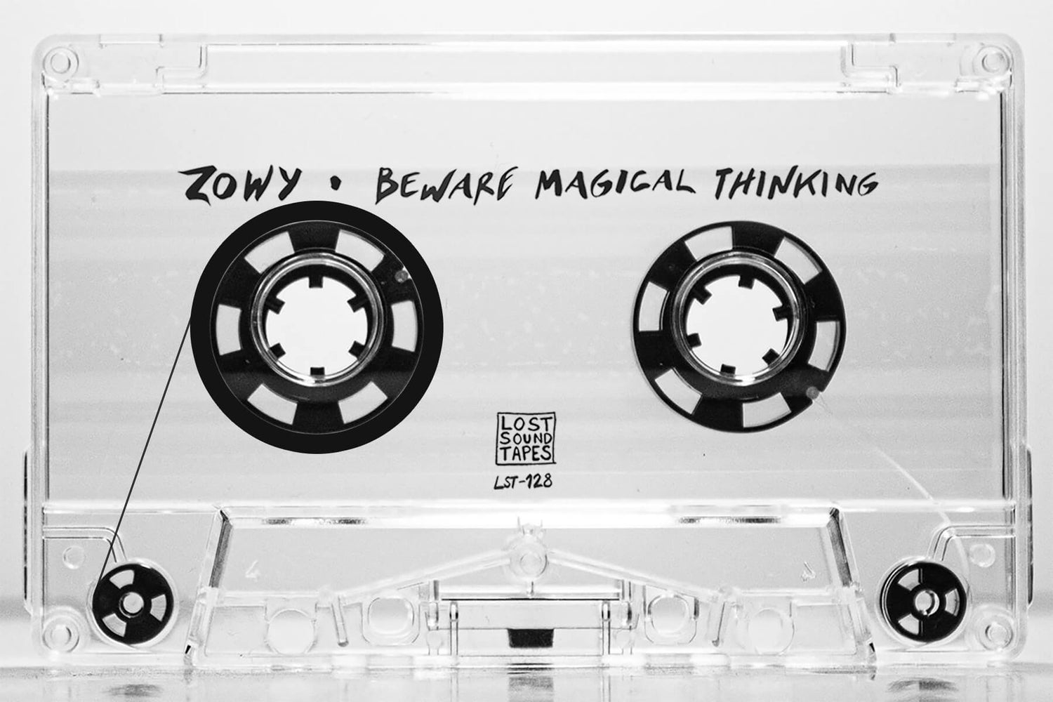 Zowy "Beware Magical Thinking" clear cassette tape with imprinting